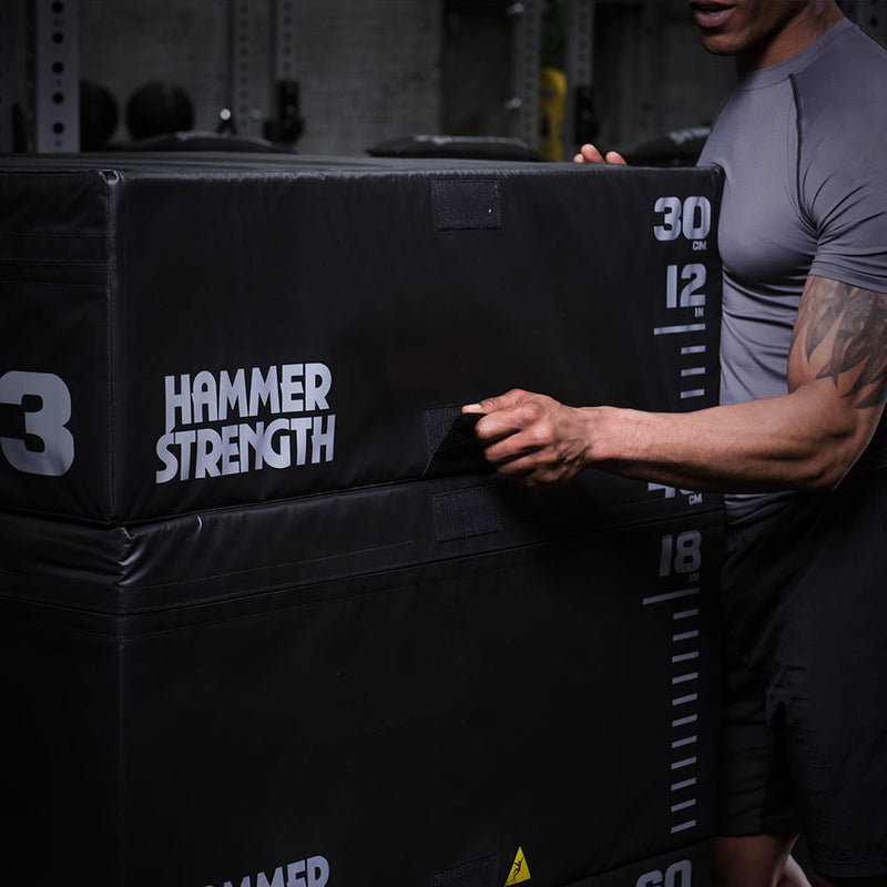 Man adjusting plyo boxes