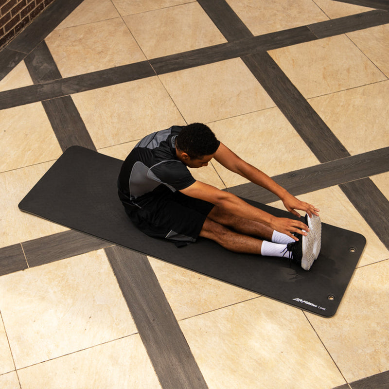 Stretching on Life Fitness Core Mat