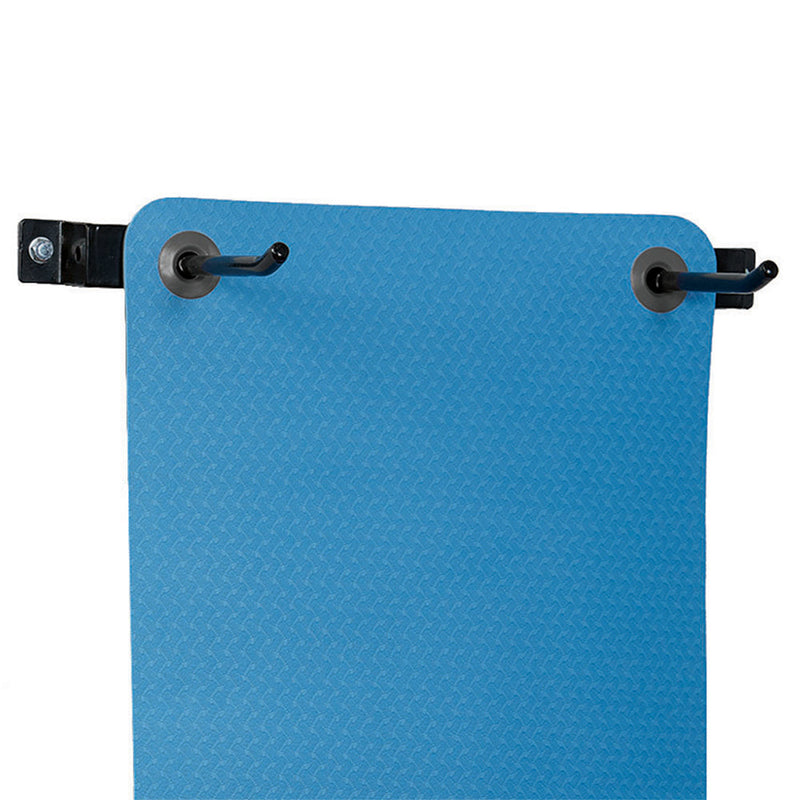 Mat hanging on wall mounted mat rack